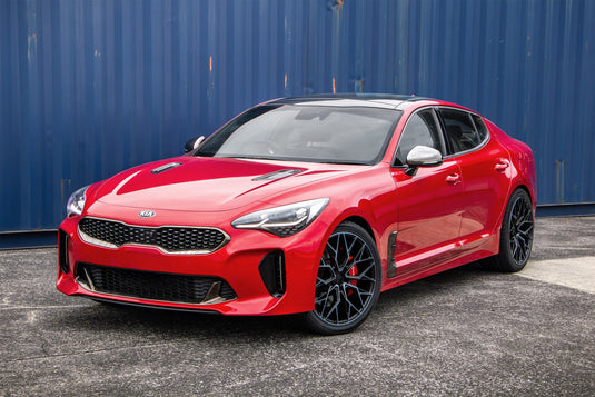 2020 Kia Stinger GT in red fitted with BGW Venom 20-inch Dark Tint alloy wheels — front three-quarter view