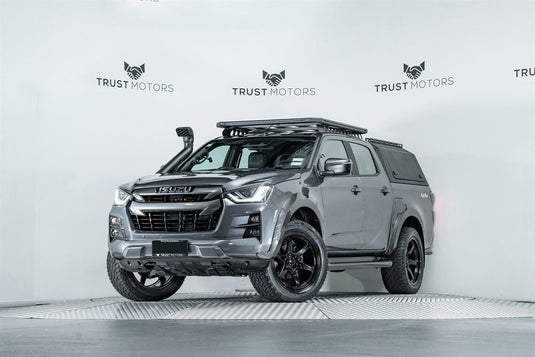 2021 Isuzu D-Max 4x4 dual cab in Obsidian Grey with canopy and roof rack fitted with BGW Escobar Gloss Black alloy wheels and all-terrain tyres — front three-quarter view at Trust Motors