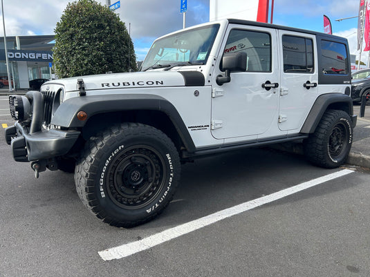 Jeep Wrangler Rubicon Unlimited on Black Rhino Arsenal wheels with BFGoodrich Mud-Terrain tyres – front three-quarter view