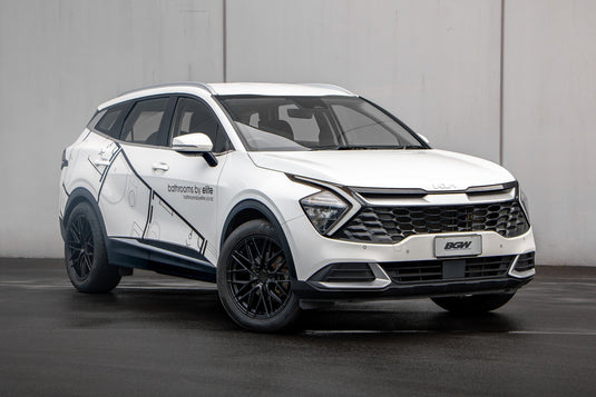 2022 Kia Sportage in white fitted with BGW Triple Five 19x8.5 alloy wheels in Matt Black — front three-quarter view