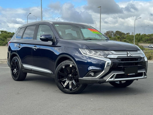 2021 Mitsubishi Outlander LS 4WD in Sapphire Blue fitted with Covert RV3 Gloss Black alloy wheels and 245/45ZR20 performance tyres — front three-quarter view at Pearce Brothers