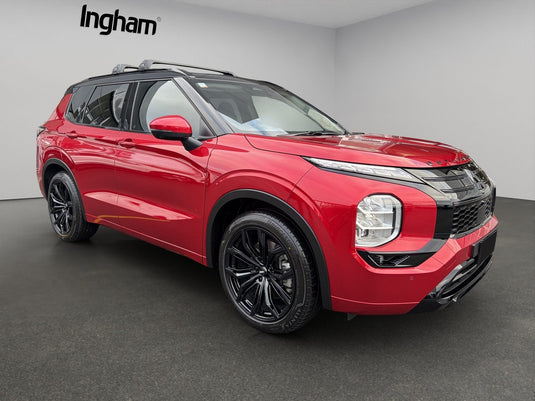 2025 Mitsubishi Outlander in red fitted with BGW Black Widow alloy wheels in Gloss Black — front three-quarter view