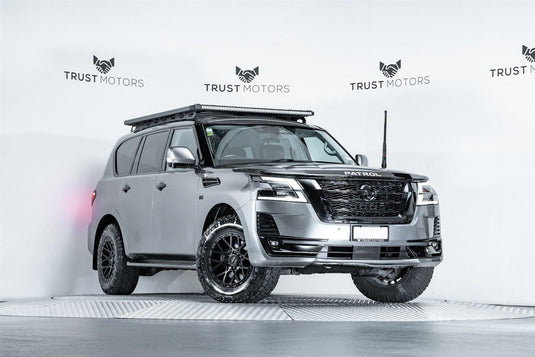 2020 Nissan Patrol V8 in silver fitted with ROH Crawler Matt Black alloy wheels and all-terrain tyres — front three-quarter view at Trust Motors