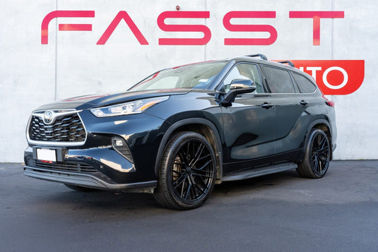 2023 Toyota Highlander in Midnight Black with lip kit fitted with BGW Prost Gloss Black alloy wheels and 265/40ZR22 performance tyres — front three-quarter view at FASST Auto