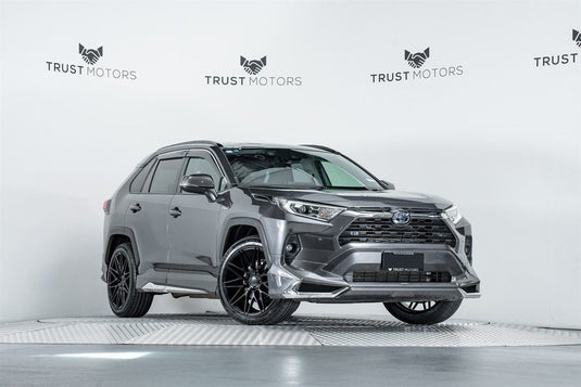 2019 Toyota RAV4 Hybrid in Magnetic Grey with aero kit fitted with Covert CV8 Matt Black alloy wheels and Tourador X Speed TU1 performance tyres — front three-quarter view at Trust Motors