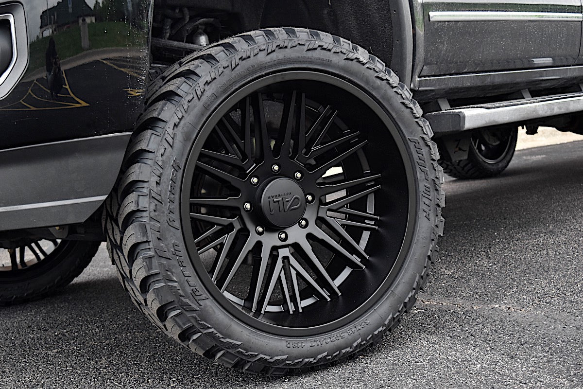 GMC Sierra on Cali Off Road Rawkon w AMP M/T