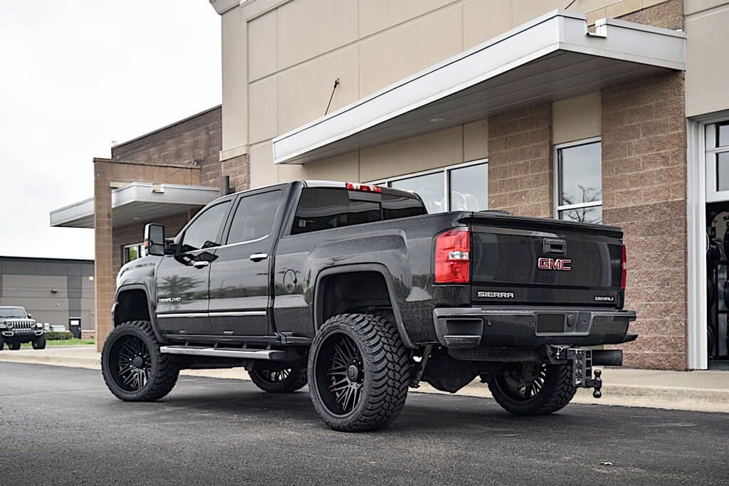 GMC Sierra on Cali Off Road Rawkon w AMP M/T